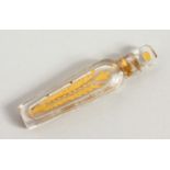 A SMALL 19TH CENTURY GILDED GLASS SCENT BOTTLE AND STOPPER. 7cms long.