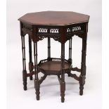 AN EDWARDIAN MAHOGANY OCTAGONAL SHAPED CENTRE TABLE, with pierced frieze, cluster column supports