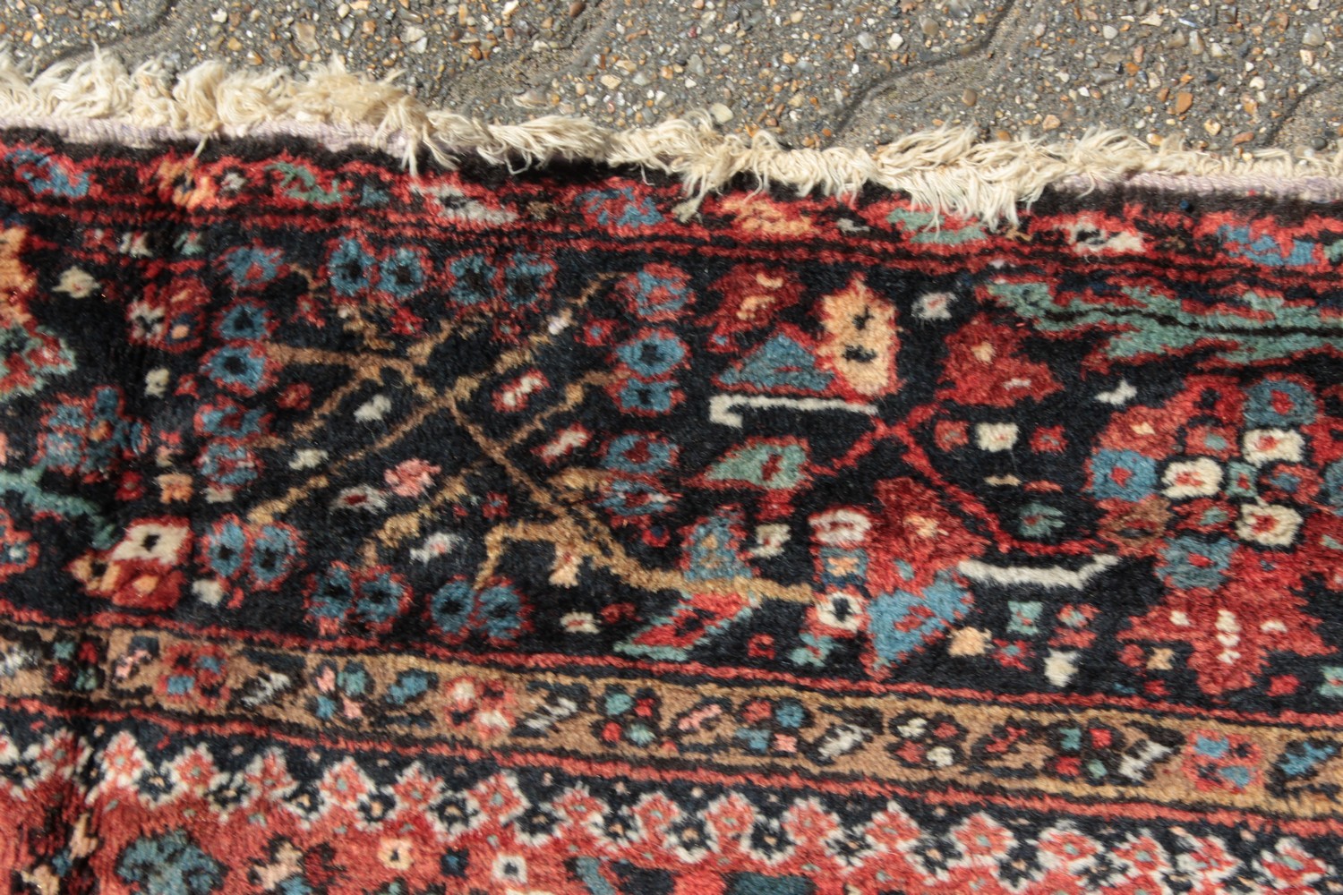 A LARGE PERSIAN KARAJA CARPET with seven central medallions in red and blue. 10ft 10ins x 7ft 4ins. - Image 5 of 11