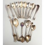 A SET OF SIX BEAD EDGE COFFEE SPOONS, TWO PAIRS OF SUGAR TONGS and sundry spoons. Weight 8ozs.