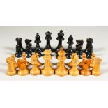 A BOXWOOD CHESS SET in a box.