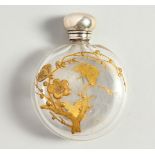 AN ART NOUVEAU GLASS SCENT BOTTLE with flowers and butterflies in gilt with a palin silver screw