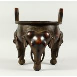 A LARGE 19TH CENTURY JAPANESE BRONZE ELEPHANT CENSER supported on three elephant legs with two