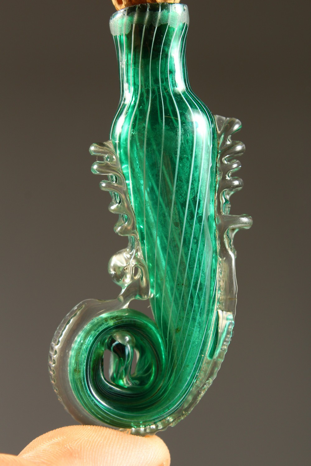 AN ITALIAN GREEN GLASS SPIRAL SHAPED SCENT BOTTLE with cork stopper. 7.5cms long. - Image 4 of 7