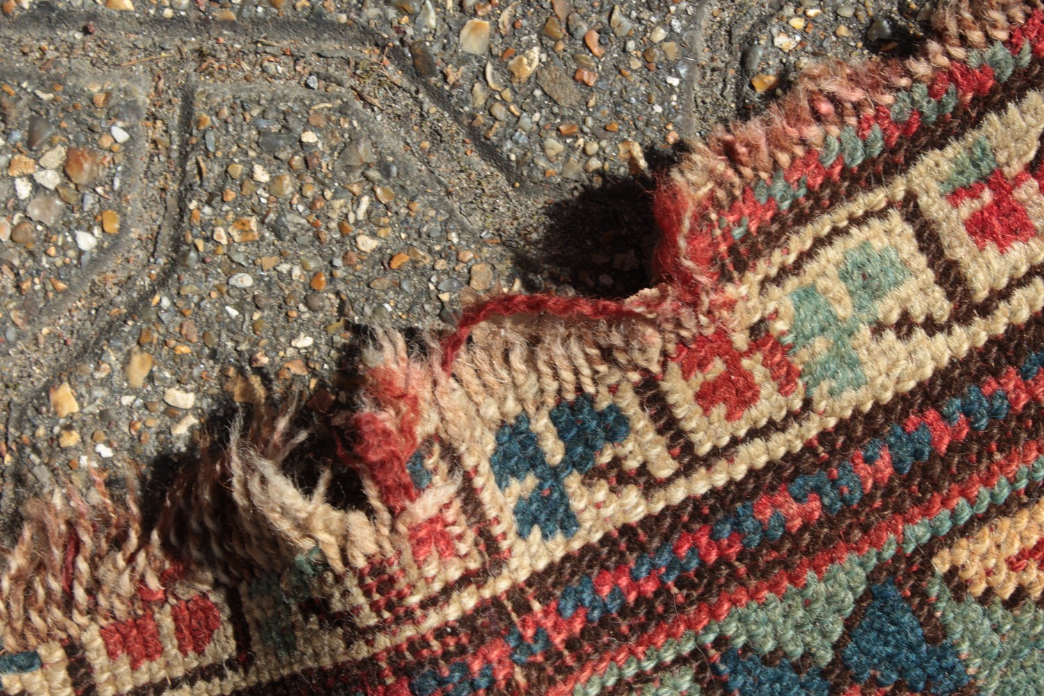 A CAUCASIAN RUNNER with typical motifs in red and blue. 10ft 9ins x 3ft 6ins. - Image 2 of 8