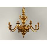 A SUPERB LOUIS XVITH DESIGN EIGHT BRANCH GILDED BRONZE CHANDELIER with scrolling branches,