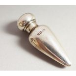 A SMALL VICTORIAN PLAIN TAPERING SCENT BOTTLE. Birmingham 1887. 5cms long.