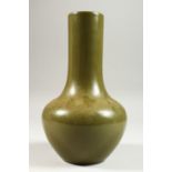 A CHINESE GREEN GLAZED BOTTLE VASE. Six character mark in blue. 9ins high.