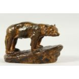 GEORGES OMERTH (Active 1895-1925) FRENCH, A SMALL BRONZE MODEL OF A POLAR BEAR, standing on a