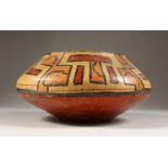 A SIMILAR PERUVIAN CIRCULAR POT. 13cms high x 25cms diameter.