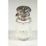 A SMALL VICTORIANPLAIN FACET CUT SCENT BOTTLE with repousse silver top and plain glass stopper. 6cms