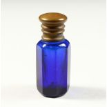 A SMALL VICTORIAN BRISTOL BLUE GLASS SCENT BOTTLE AND STOPPER. 4.5cms high.