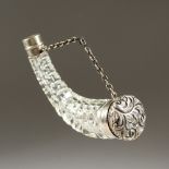 A GOOD VICTORIAN TRUMPET SHAPED CUT GLASS SCENT BOTTLE with repousse silver top, glass stopper and
