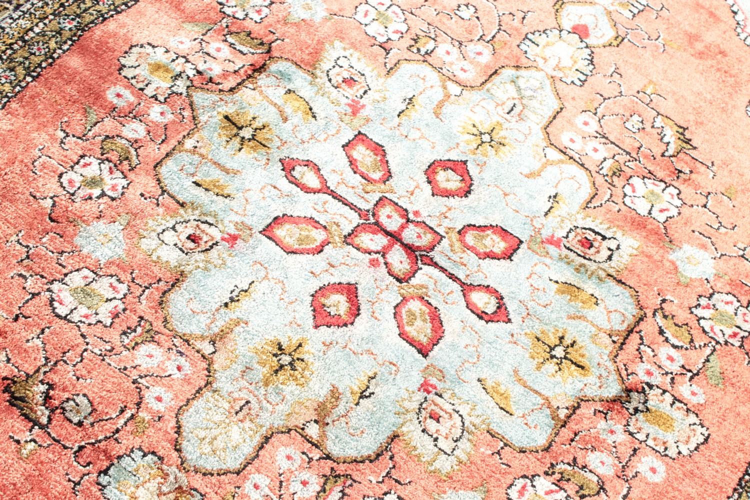 A FINE PERSIAN SILK RUG with central motif on a red background and floral border. 4ft 2ins x 2ft - Image 5 of 9