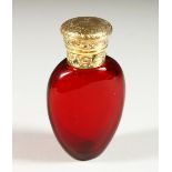 A GOOD VICTORIAN RUBY GLASS SCENT BOTTLE with engraved silver gilt top with stag crest and M.P.G.
