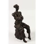 CHARLOTTE VAN PALLANDT (1898-1997) DUTCH. AN ABSTRACT BRONZE OF A SEATED MAN. Monogrammed CP. 21.