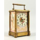 A SEVRES DESIGN CARRIAGE CLOCK with painted panels and column sides. 5.5ins diameter.