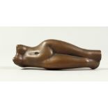 A BRONZE TORSO. Initialled P. No. 28/100. 13cms long.