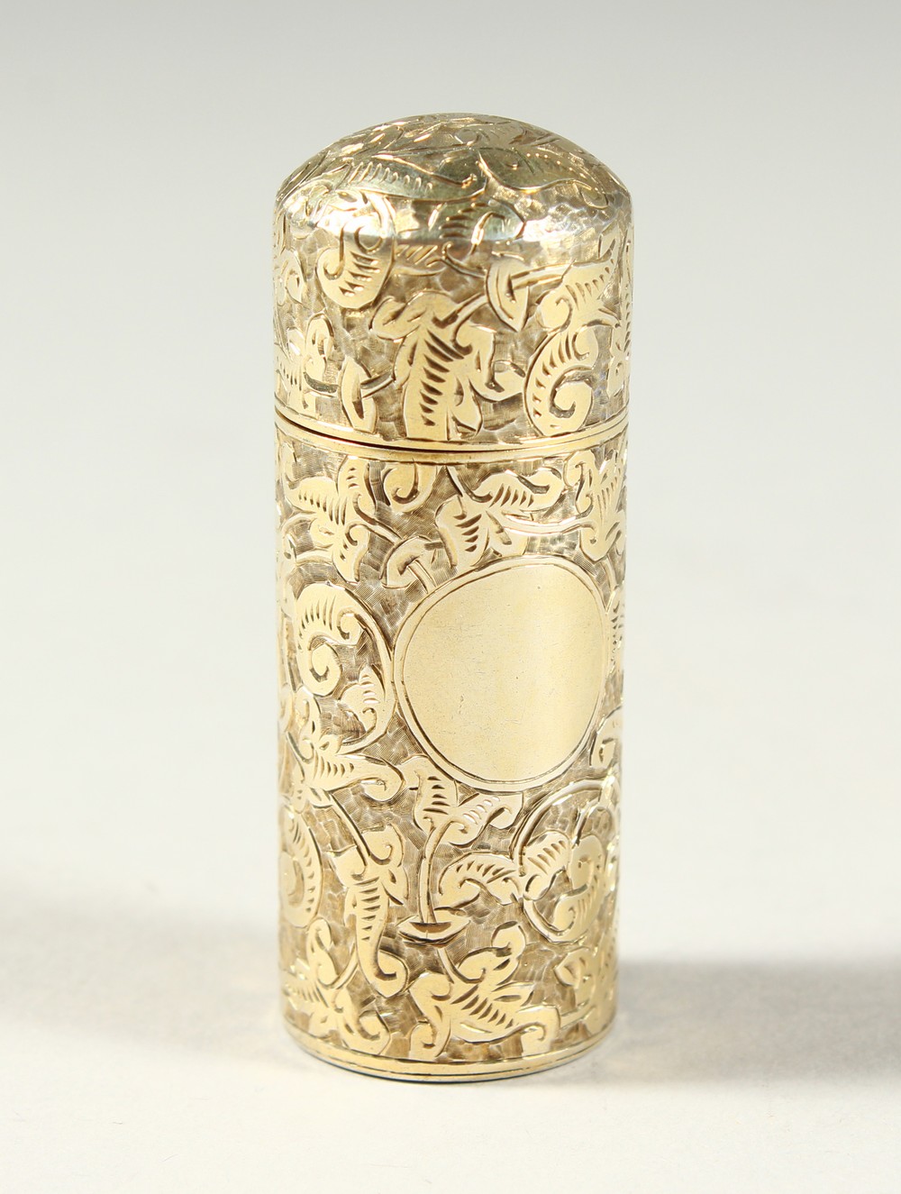 A GOOD VICTORIAN SILVER GILT ENGRAVED DAUM SHAPED SCENT BOTTLE with glass stopper. Chester 1888. 5.