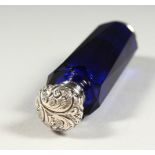 A VICTORIAN FACET CUT BRISTOL BLUE DOUBLE ENDED SCENT BOTTLE AND VINAIGRETTE. 9.5cms long.