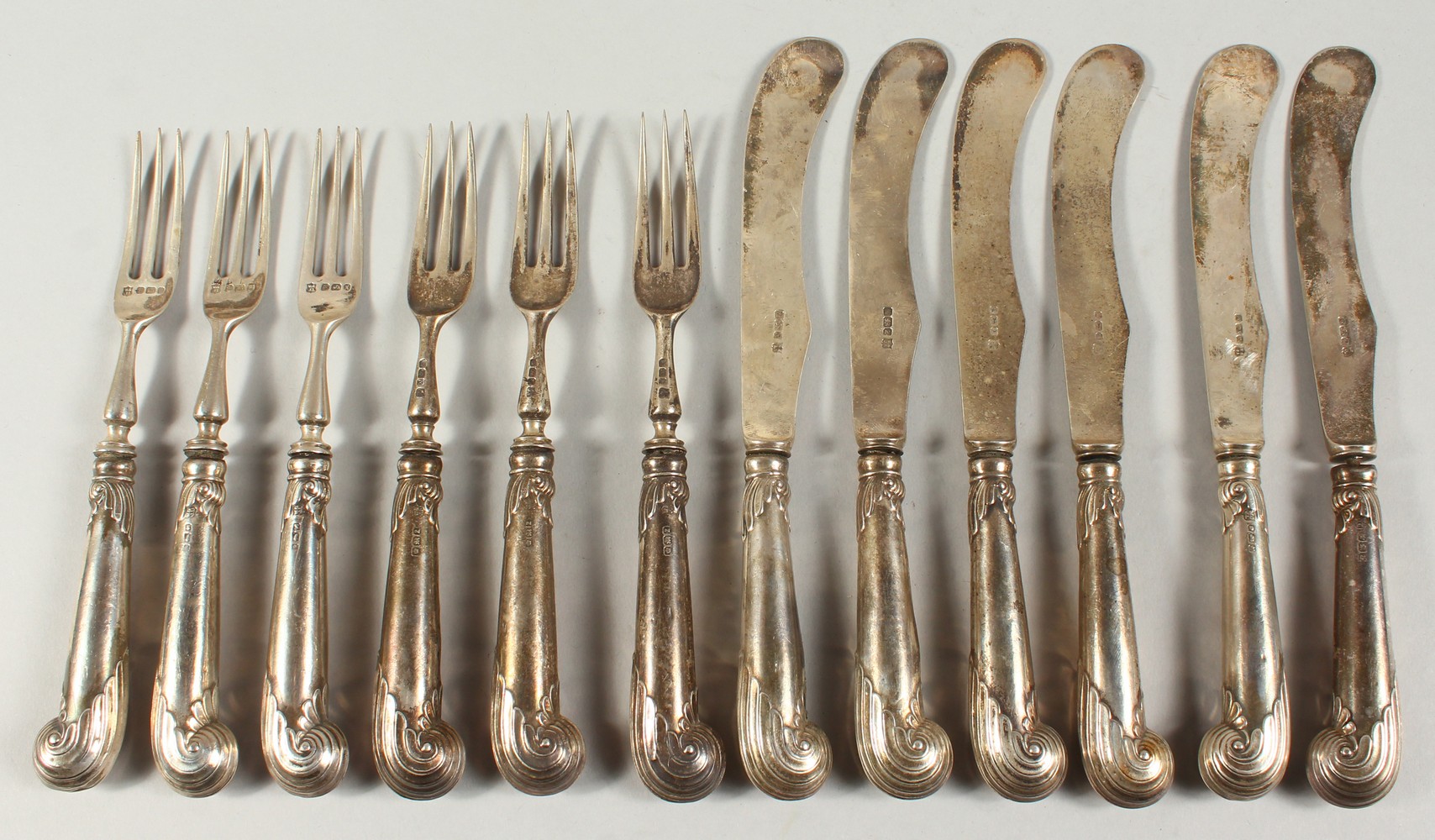 A SET OF TWELVE VICTORIAN PISTOL HANDLED KNIVES AND FORKS. Sheffield 1892. - Image 2 of 12