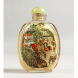 A GOOD SNUFF BOTTLE painted with a boat, buildings and figures.