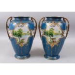 A GOOD PAIR OF JAPANESE SHOWA PERIOD BLUE GROUND PORCELAIN NORITAKE VASES, both with two panels of