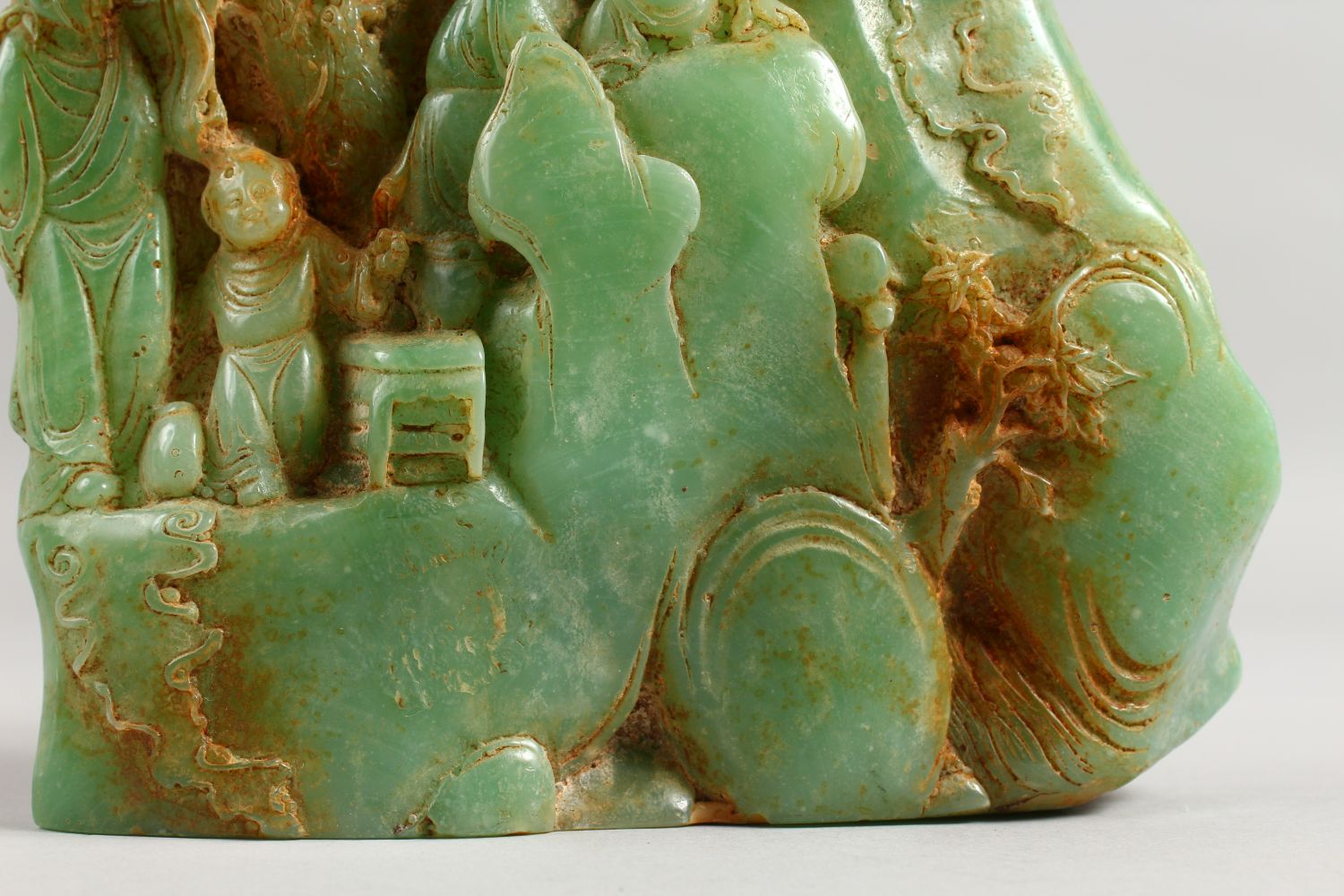 A CARVED GREEN STONE GROUP with four figures. 8.5ins high. - Image 4 of 8