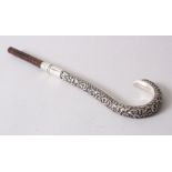 A 19TH CENTURY INDIAN SILVER PARASOL HANDLE, marked L. M.