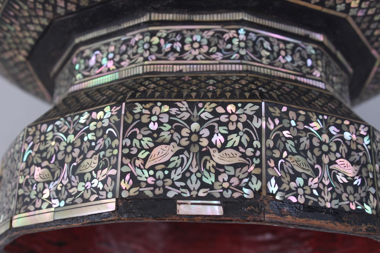 A LARGE 19TH CENTURY THAI MOTHER OF PEARL INLAID LACQUERED TWELVE SIDED PEDESTAL BOWL, 36cm diameter - Image 5 of 7