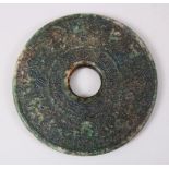A GOOD 20TH CENTURY CHINESE CARVED JADE / NEPHRITE ZODIAC BI DISK, carved with zodiac decoration