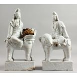 A RARE PAIR OF 18TH CENTURY BLANC DE CHINE GROUPS OF GUANYIN riding a kylin. 9ins high.