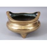 A 19TH CENTURY CHINESE BRONZE CIRCULAR CENSER with large seal mark, 17cm diameter.