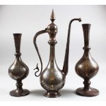 A GARNITURE OF 19TH CENTURY PERSIAN QAJAR GOLD INLAID AND CHASED EWER AND PAIR OF BOTTLE VASES, 39cm