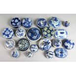 A BOX OF TWENTY 18TH AND 19TH CENTURY BLUE AND WHITE VASE LIDS.