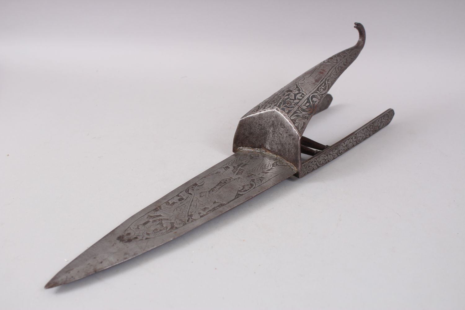 A LARGE 19TH CENTURY SOUTH INDIAN ENGRAVED STEEL HOODED KATAR, 52cm long. - Image 2 of 5