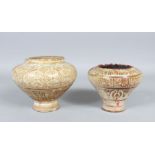 TWO 13TH CENTURY PERSIAN KASHAN POTTERY VASES of circular form, 13cm high, 15cm diameter and 10cm