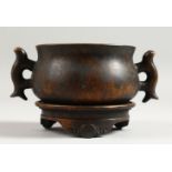 A BRONZE CIRCULAR CENSER ON STAND. 4ins diameter. Six character impressed mark.