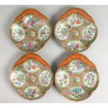 A SUPERB SET OF FOUR CANTON SHELL SHAPED DISHES with four main panels of figures, birds, insects and