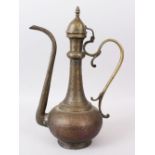 AN 18TH - 19TH CENTURY ISLAMIC ENGRAVED COFFEE POT AND COVER.