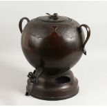 A LARGE 18TH - 19TH CENTURY JAPANESE GLOBULAR SHAPED BRONZE URN, withlooped handles, the lid with