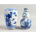 TWO CHINESE BLUE AND WHITE VASES. 6ins high.