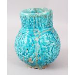 A PERSIAN, POSSIBLY 12TH - 13TH CENTURY, TURQUOISE VASE (AF).