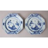 A PAIR OF EARLY 18TH CENTURY CHINESE BLUE AND WHITE OCTAGONAL PLATES with a lake design, flowers