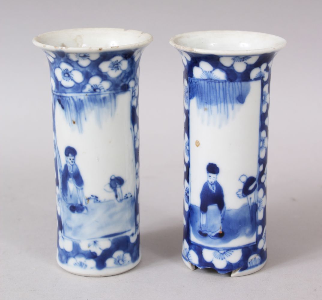 A PAIR OF 19TH CENTURY CHINESE MINIATURE BLUE & WHITE VASES, decorated with figures and