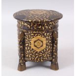 A GOOD JAPANESE MEIJI PERIOD CYLINDRICAL LACQUER BOX & COVER, the body decorated with scrolling