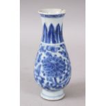 A 19TH CENTURY CHINESE BLUE & WHITE PORCELAIN VASE, with formal scrolling decoration, the base
