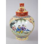 A CHINESE FAMILLE ROSE PORCELAIN VASE AND COVER / INCENSE BURNER, with two panels of figures