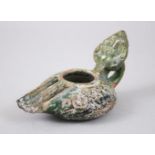 A RARE 8TH-9TH CENTURY SYRIA UMAYYAD GREEN GLAZED POTTERY OIL LAMP, 14cm long.