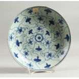 A CHINESE KANG HSI CIRCULAR BLUE AND WHITE SAUCER DISH. 8.75ins diameter.